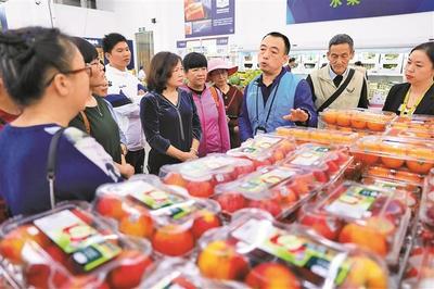 市民进商超零距离了解农产品知识